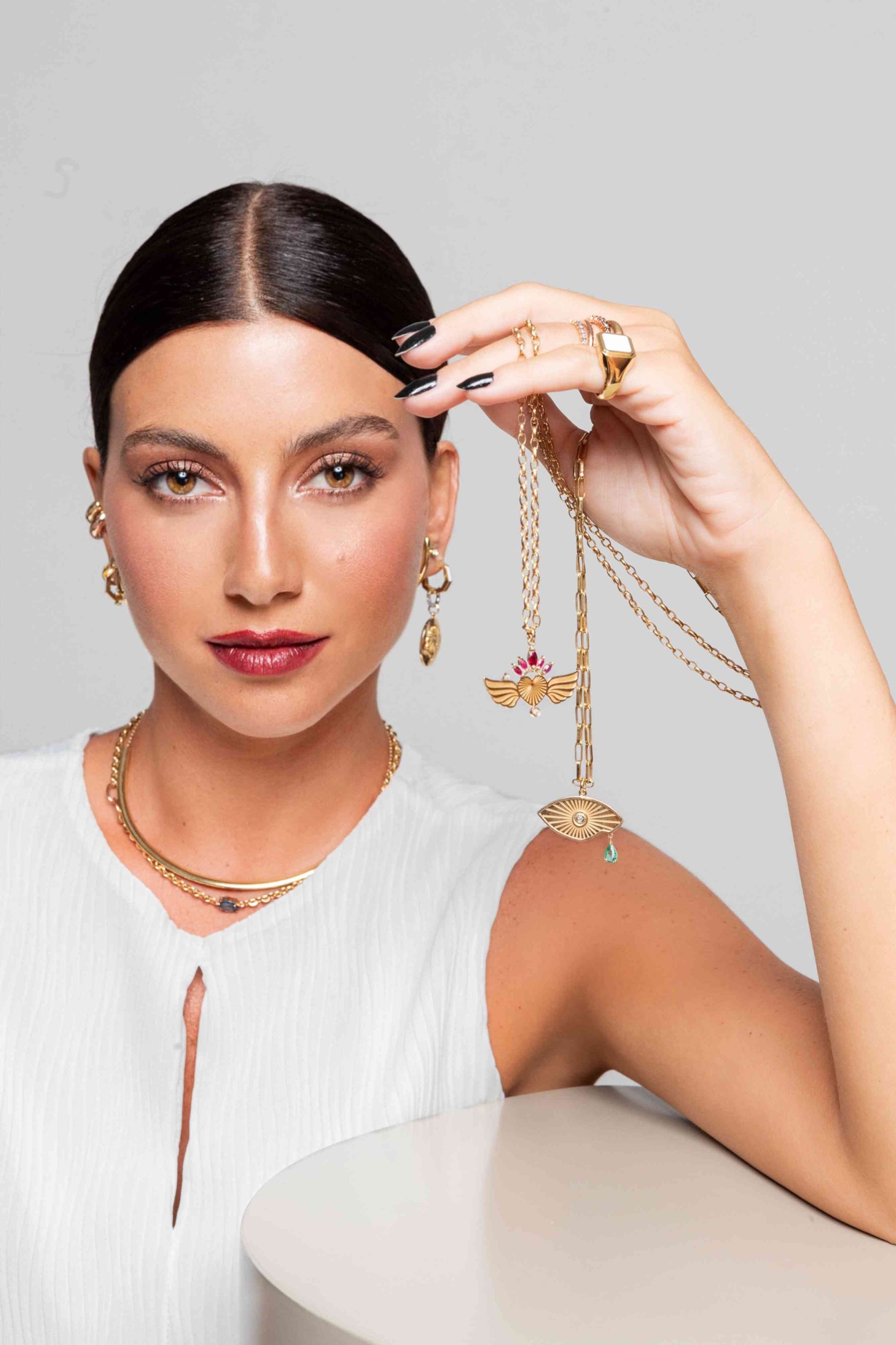 PINGENTE OLHO GREGO COM DIAMANTE E ESMERALDA