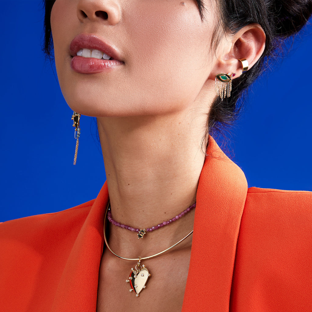 BRINCO OLHO GREGO FRANJAS COM ESMERALDA E RUBI