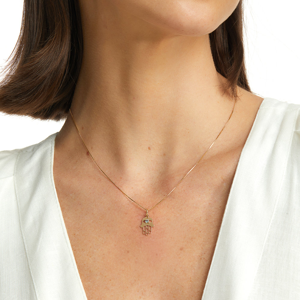 PINGENTE MÃO DE HAMSÁ COM GEMA CENTRAL