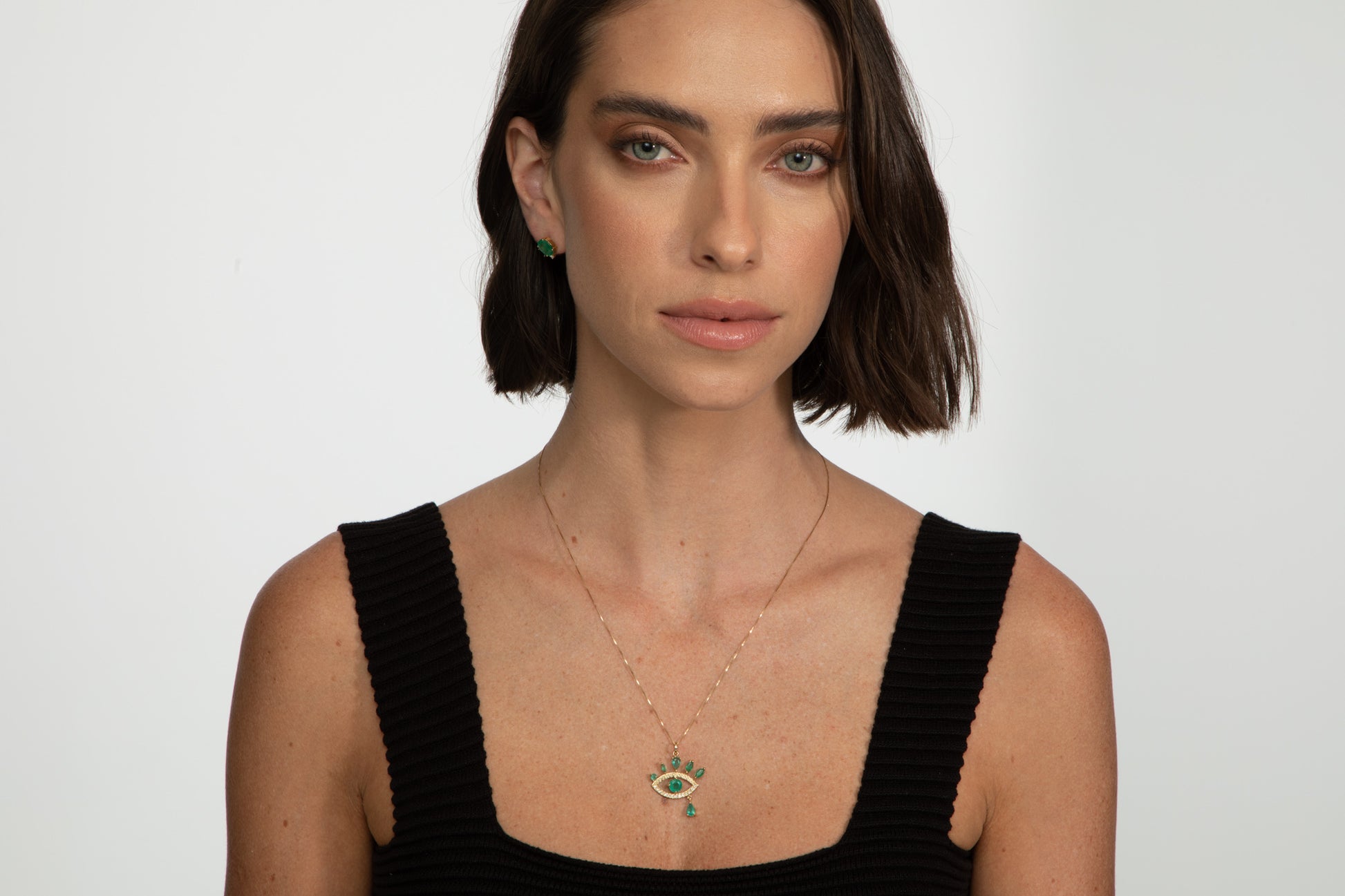 PINGENTE OLHO GREGO COM ESMERALDA E DIAMANTE